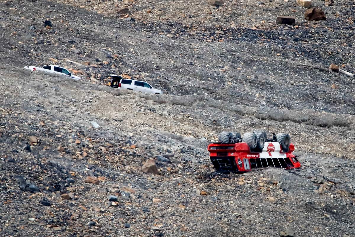 RCMP attend the scene of a sightseeing bus rollover at the Columbia Icefields near Jasper, Alta., Sunday, July 19, 2020. 