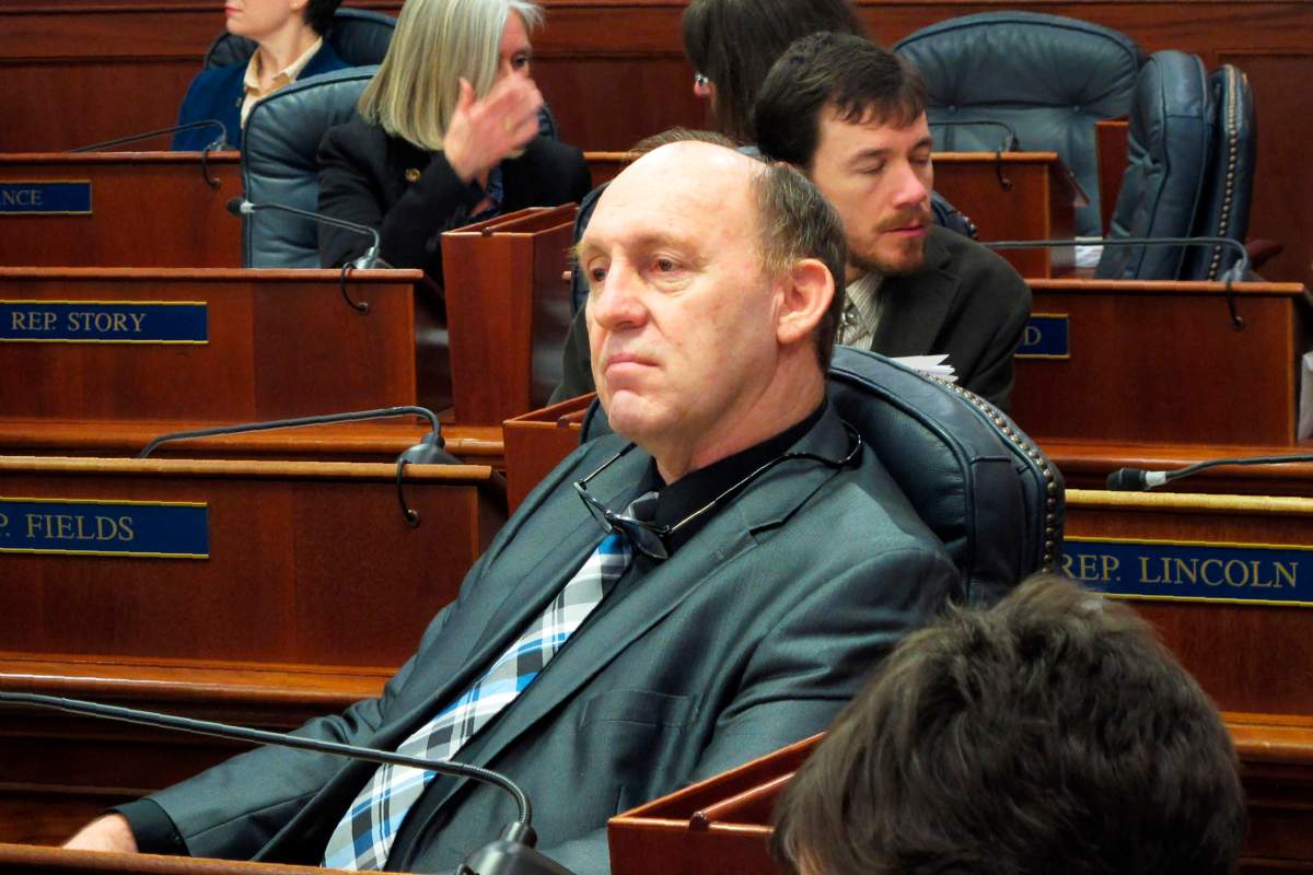 FILE - This Feb. 12, 2018 file photo, Alaska state Rep. Gary Knopp waits during a break in a floor session in which the House failed to elect a permanent speaker  in Juneau, Alaska. The Alaska House Majority says Knopp was killed in the mid-air collision of two planes near Soldotna on Friday, July 31, 2020. Alaska State Troopers would not confirm Knopp's death beyond saying the mid-air collision near the airport in Soldotna was a fatal crash. 