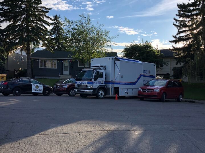 The Calgary Police Service's forensic unit remains on scene at a home in a northeast Calgary community.