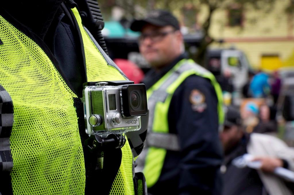 A member of the Vancouver Police Department wears a chest mounted camera in downtown Vancouver in this file photo.