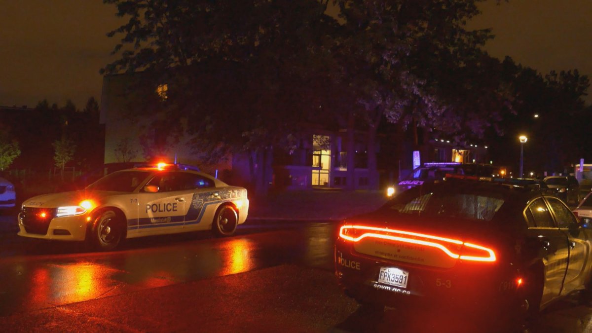 Montreal police respond to a shooting in Dollard-des-Ormeaux the night of Wednesday, July 29, 2020.