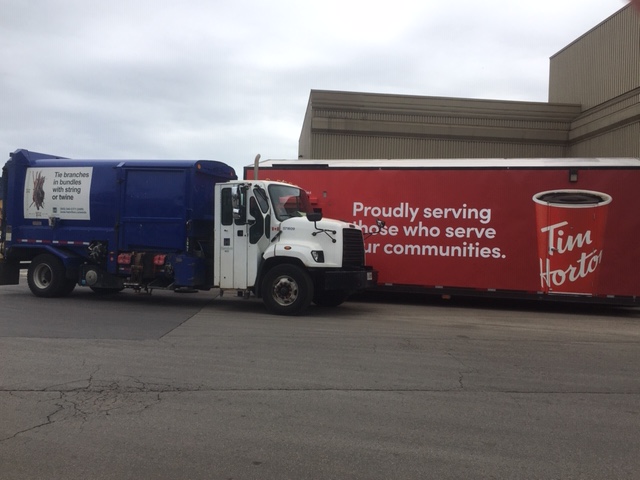 A Tim Horton's franchise owner set up a drive thru coffee trailer inside of Hamilton's waste collection yard on Thursday morning.