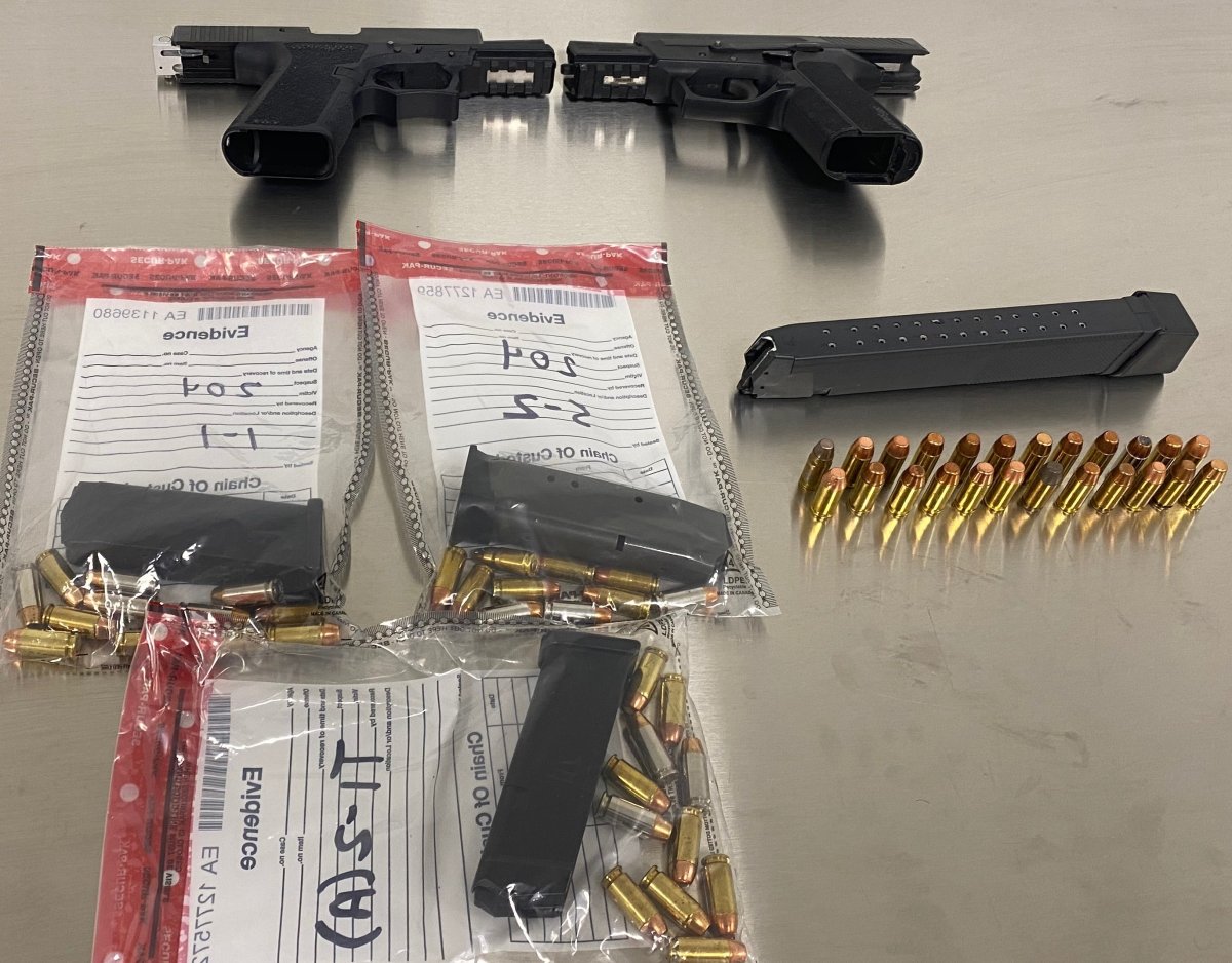Barrie police say they seized two loaded guns, drugs, money and two cars.