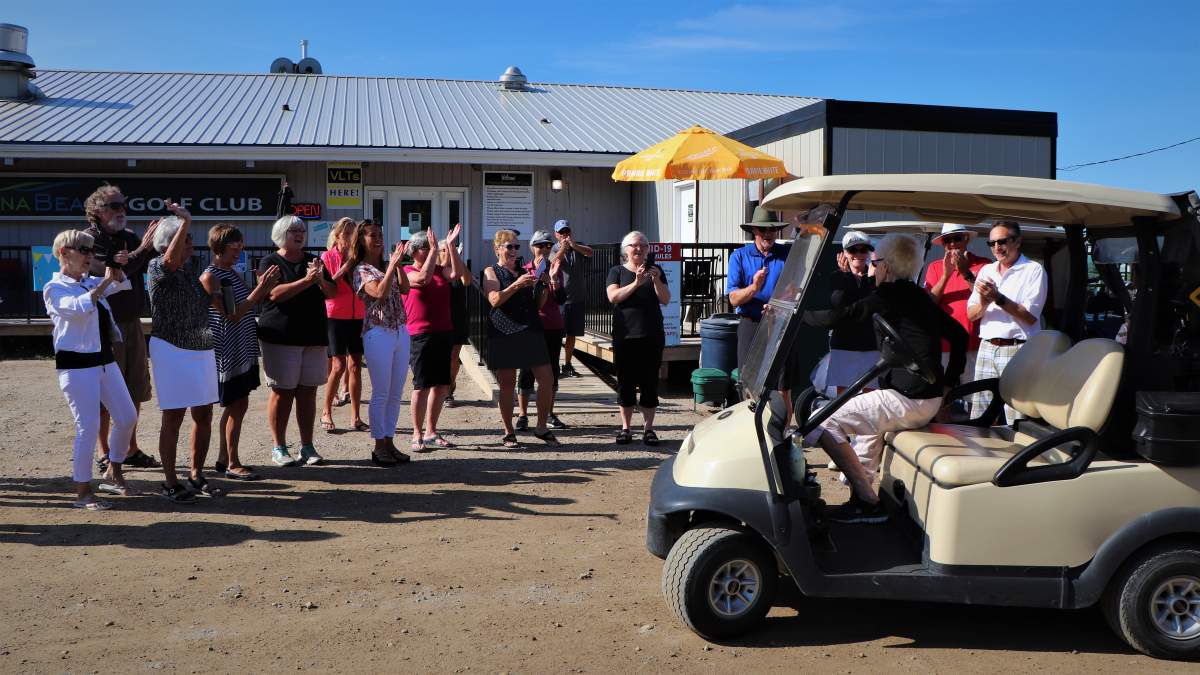 Family and friends welcome Eva Eckert, celebrating her 100th birthday, at the Regina Beach Golf Course on July 16, 2020.