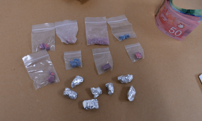 Items seized in traffic stop and search warrant.