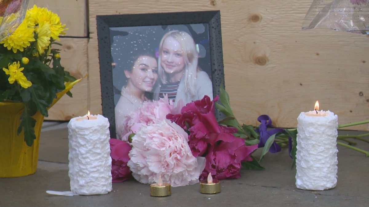 A memorial photo of Georgia Donovan and Emma Macarthur at the site of the crash that took their lives in south central Edmonton. 