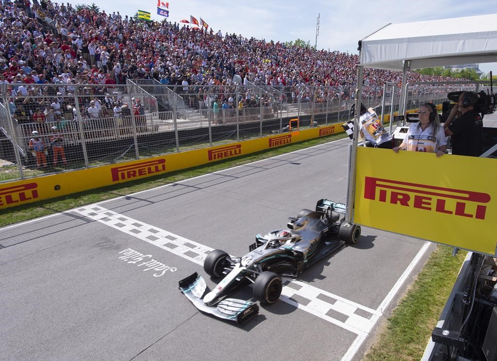 The Canadian Grand Prix has been cancelled for 2020. Mercedes driver Lewis Hamilton of Great Britain crosses the finish line to win the Canadian Grand Prix Sunday, June 9, 2019 in Montreal. THE CANADIAN PRESS/Paul Chiasson.