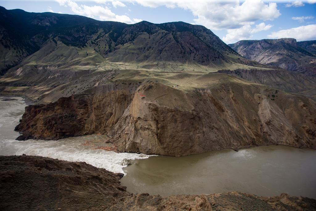 The site of a massive rock slide is seen on the Fraser River near Big Bar, west of Clinton, B.C., Wednesday, July 24, 2019. THE CANADIAN PRESS/Darryl Dyck