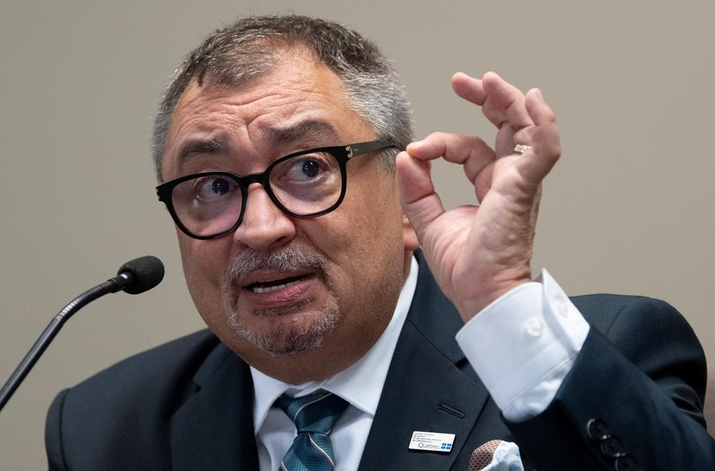 Quebec's Public Health Director Horacio Arruda responds to a question during a news conference in Gatineau, Que., Friday, July 10, 2020. THE CANADIAN PRESS/Adrian Wyld.