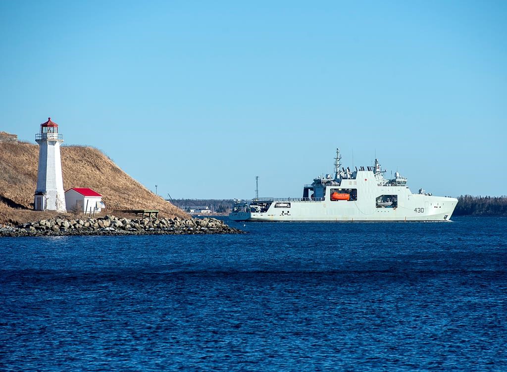 The Royal Canadian Navy is entering a new era today as it officially welcomes the long-overdue HMCS Harry deWolf into its fleet. The future HMCS Harry DeWolf, the navy's first Arctic and offshore patrol ship, built at the Irving-owned Halifax Shipyard, heads from the harbour in Halifax for sea trials on Friday, Jan. 31, 2020. THE CANADIAN PRESS/Andrew Vaughan.