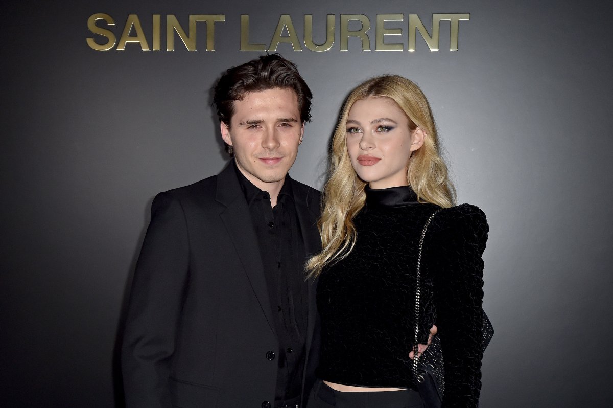 Brooklyn Beckham and Nicola Peltz attend the Saint Laurent show as part of Paris Fashion Week womenswear fall/winter 2020-21 on Feb. 25, 2020 in Paris, France.