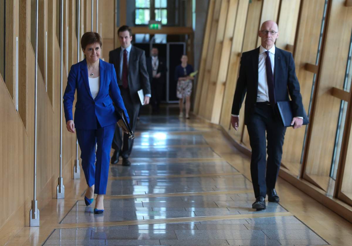 First Minister of Scotland Nicola Sturgeon and Deputy First Minister John Swinney arrive at the Scottish Parliament for the First Minister’s Statement on May 21, 2020 in Edinburgh, Scotland. (Photo by Fraser Bremner-Pool/WPA Pool/Getty Images)
