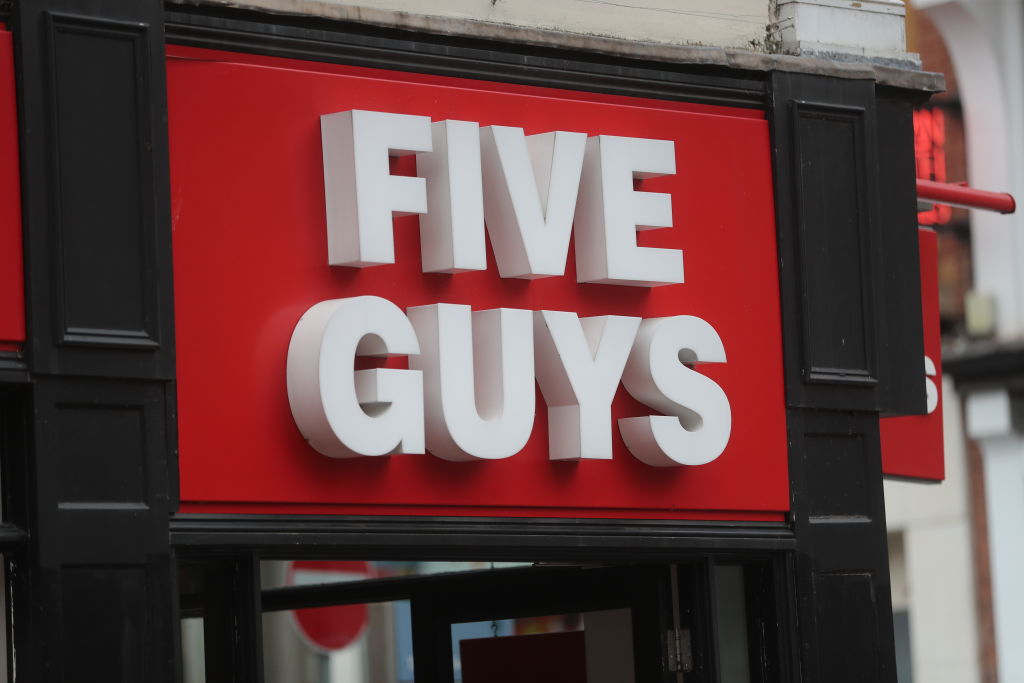 Employees at an Alabama Five Guys restaurant were let go and suspended after refusing service to three police officers.