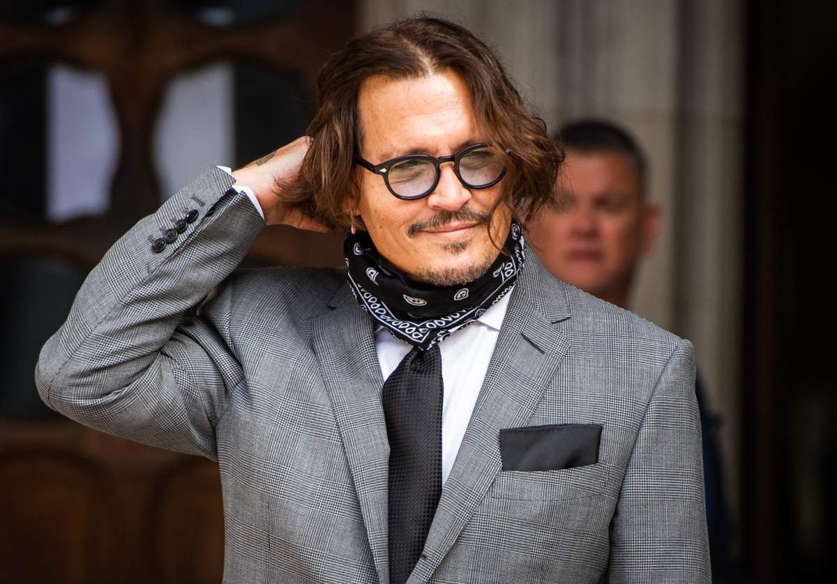 Johnny Depp arrives  at the Royal Courts of Justice, Strand on July 13, 2020 in London, England.