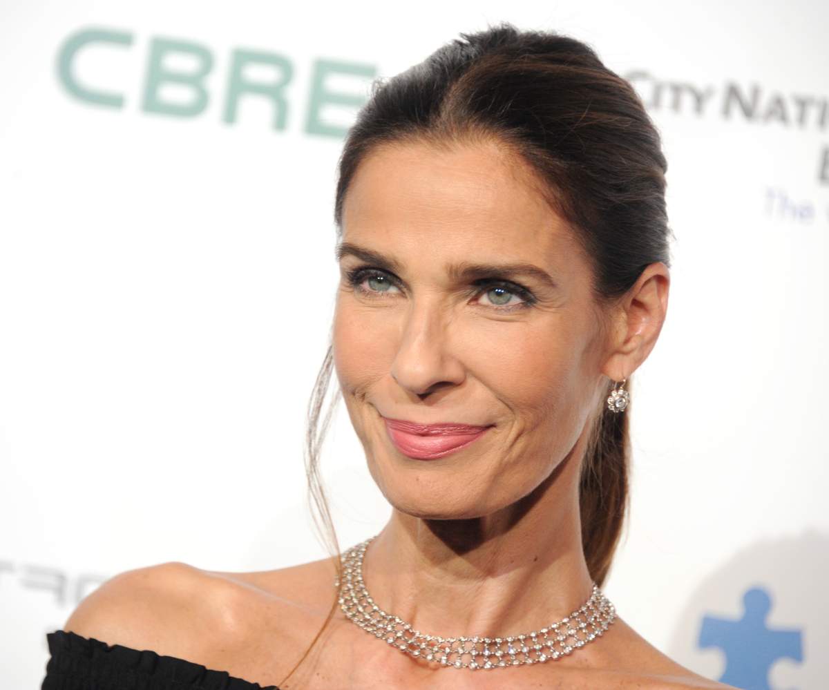 Actor Kristian Alfonso arrives at the Metropolitan Fashion Week 2016 - La Vie En Bleu - Signature Event Benefiting Autism Speaks at Warner Bros. Studios on Sept. 29, 2016 in Burbank, Calif. 