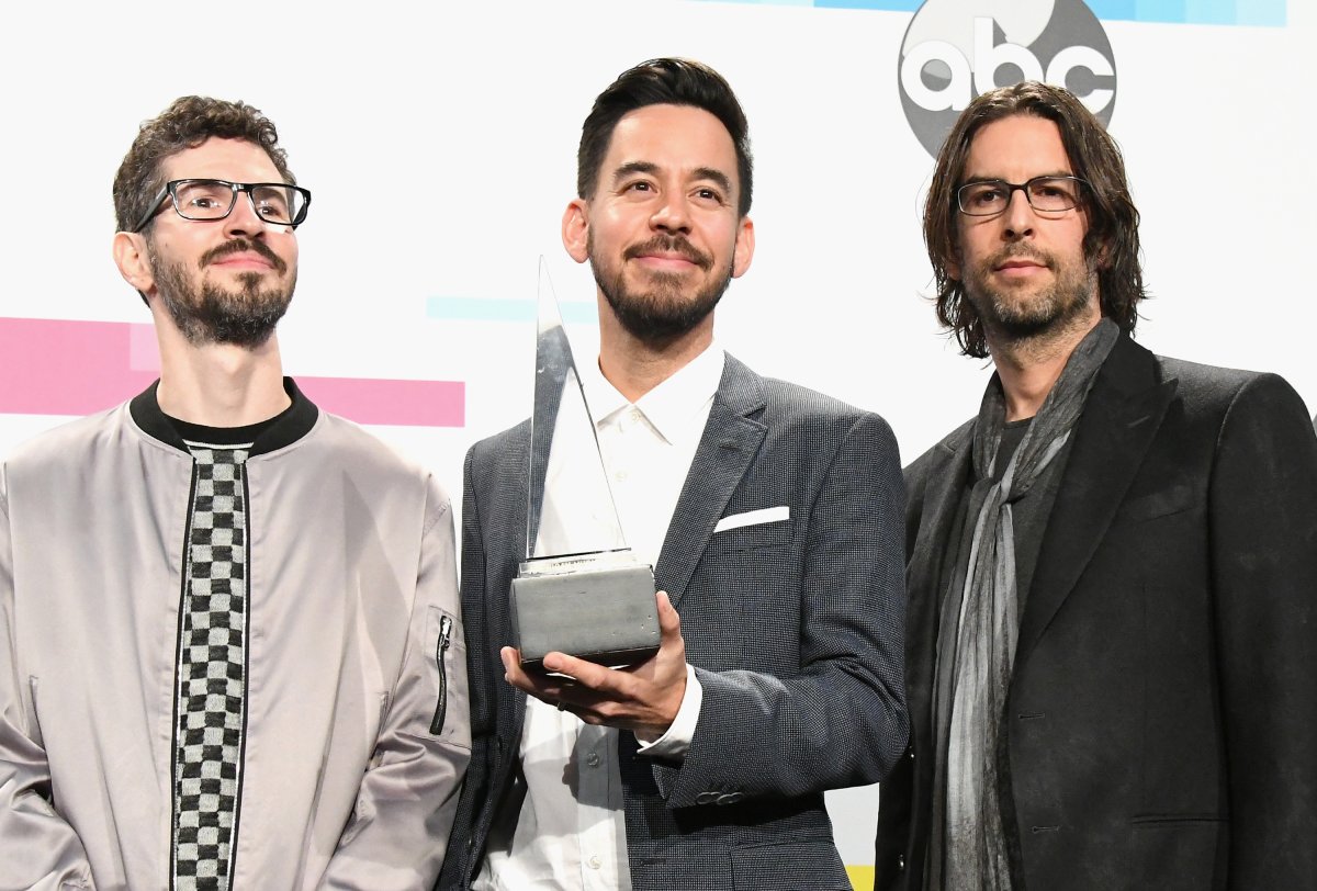 (L-R) Brad Delson, Mike Shinoda and Rob Bourdon of the band Linkin Park pose in the press room during the 2017 American Music Awards at Microsoft Theater on November 19, 2017 in Los Angeles, Calif.