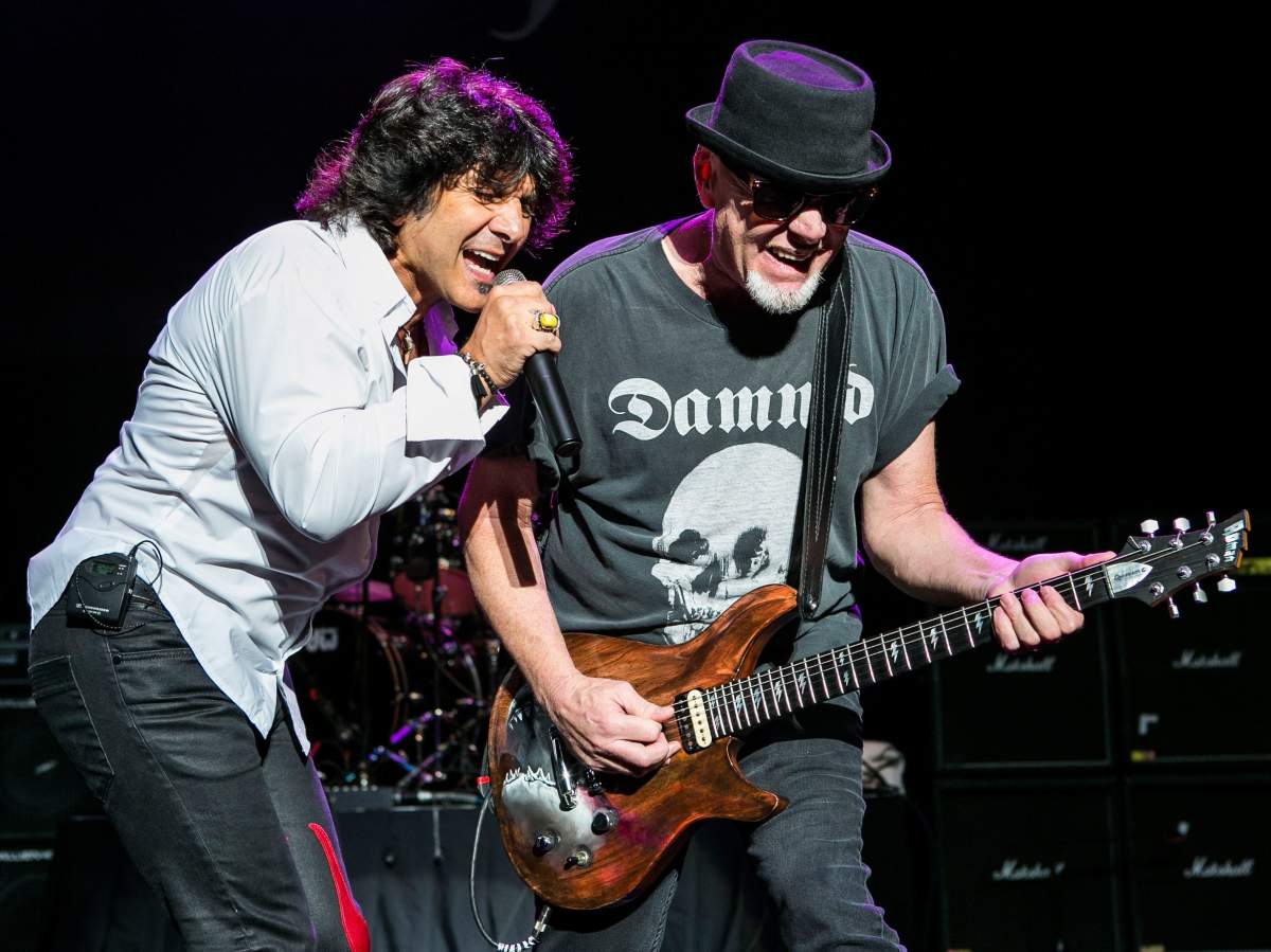 Terry Ilous (L) and Mark Kendall of Great White performs at DTE Energy Music Theater on Aug. 28, 2014 in Clarkston, Mich.