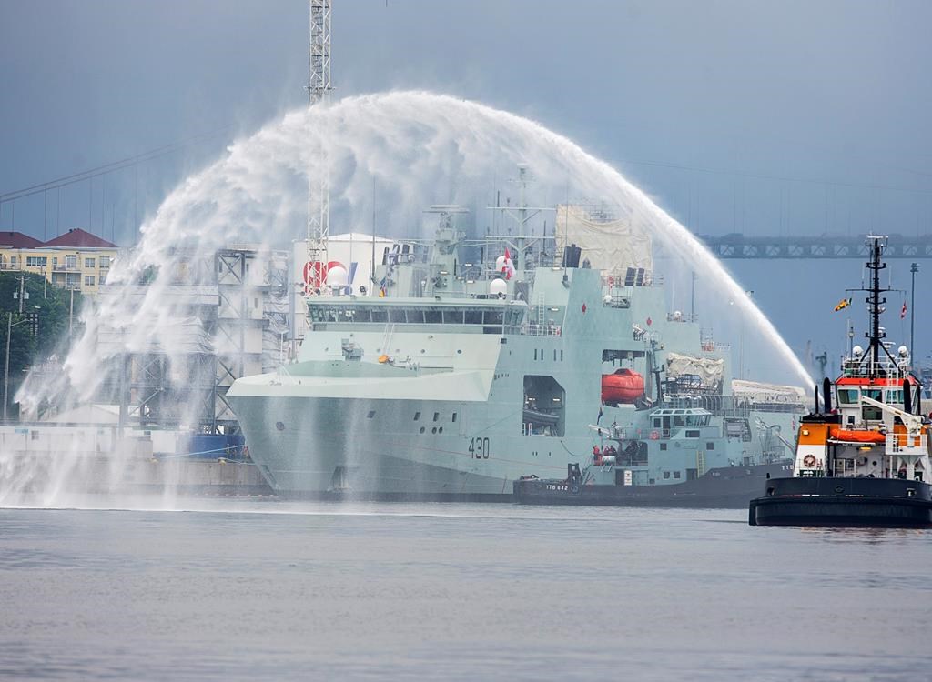 HMCS Harry deWolf heads from the Irving-owned Halifax Shipyard on its way to being delivered to the Royal Canadian Navy dockyard in Halifax on Wednesday, July 31, 2020. The vessel is the first of the new offshore Arctic patrol ships and will conduct surveillance operations, assist in anti-smuggling and anti-piracy operations as well as humanitarian assistance and disaster relief.