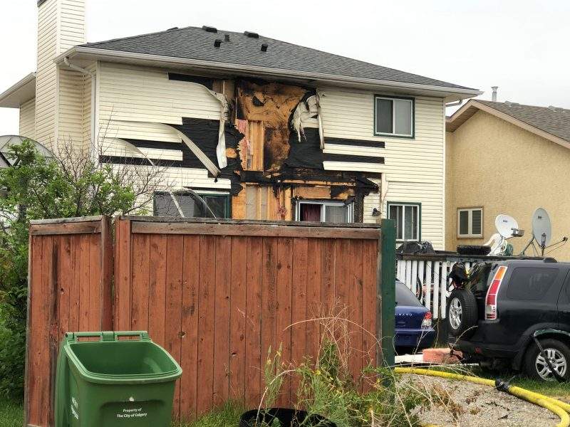Calgary firefighters were called to a home on Harvest Oak Crescent Northeast on Thursday, July, 23, 2020 for reports of smoke and flames coming from the back deck.