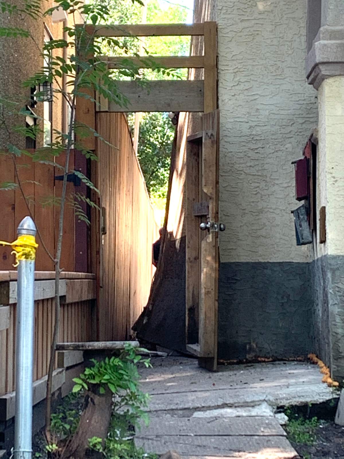 The wall of a home in the area of 112 Avenue and 91 Street appeared to be damaged after an explosion Monday, July 20, 2020.