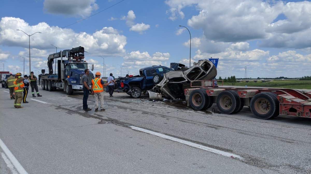 Responders on the scene of a major crash on the Perimeter Highway near Fermor on Friday.