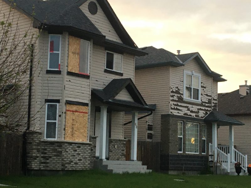 Damage from a devastating hailstorm on June 13, 2020 can be seen along Saddlemont Close. 