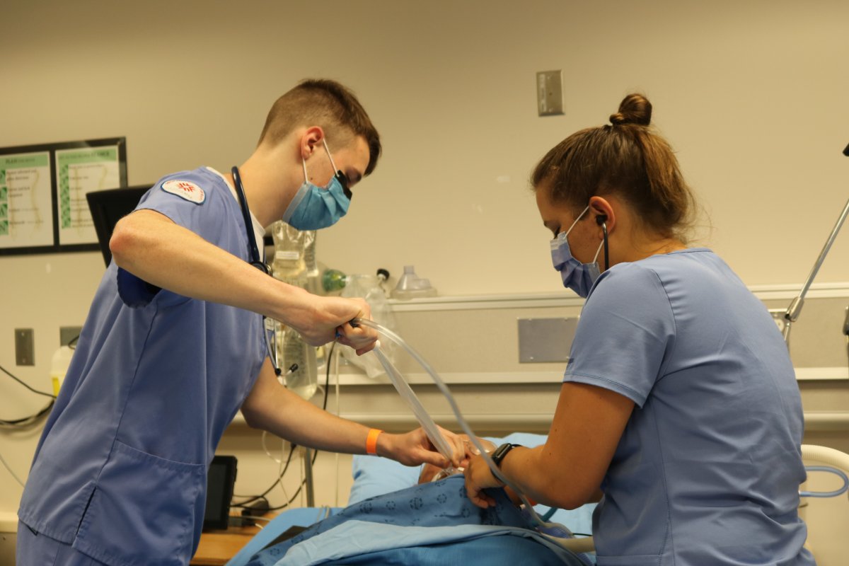 Respiratory therapy students Aaron Lesouder left and Kaitlin Smith right practicing intubation in class at Fanshawe College after the school let students back to class to finish semester amid coronavirus pandemic on July 22, 2020 
.