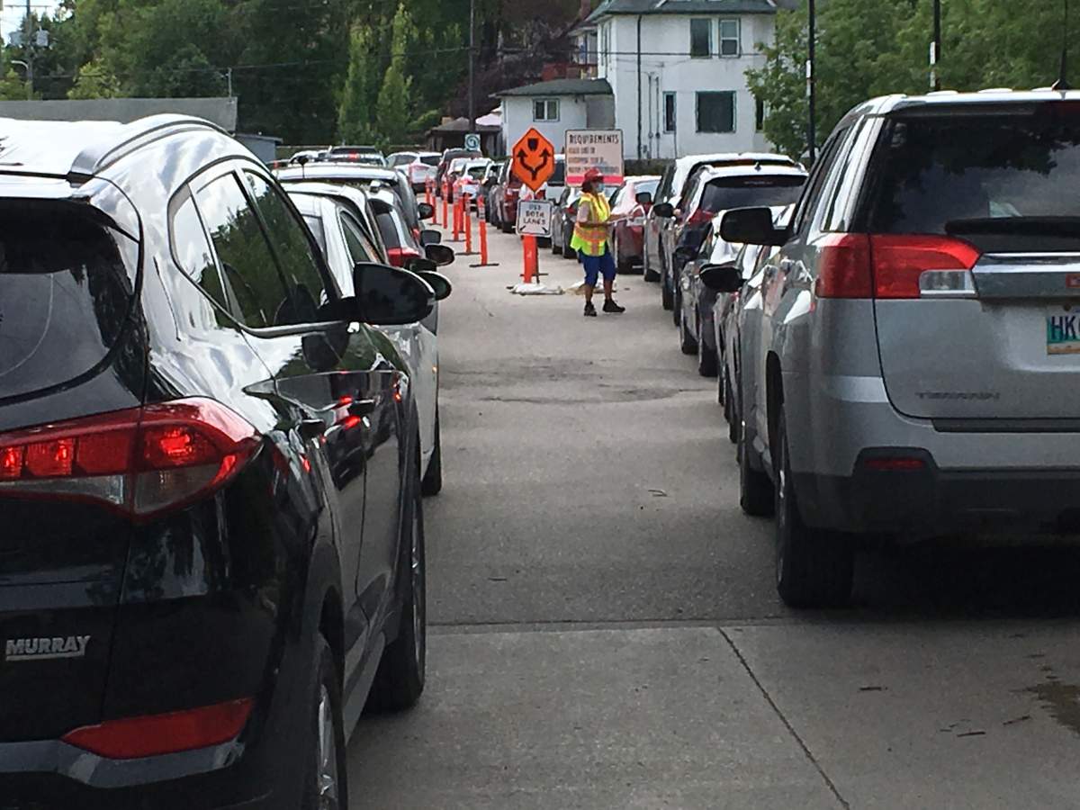 The testing site lineup at Winnipeg’s 1284 Main St. facility on Monday.