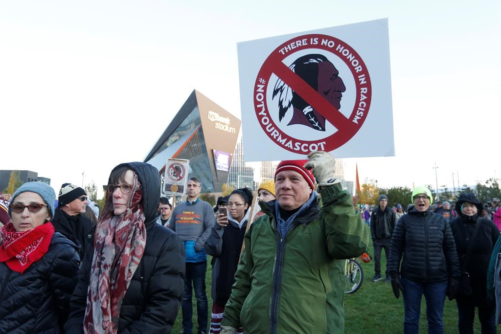 Native American leaders protest against the Washington Redskins team name outside U.S. Bank Stadium in 2019.