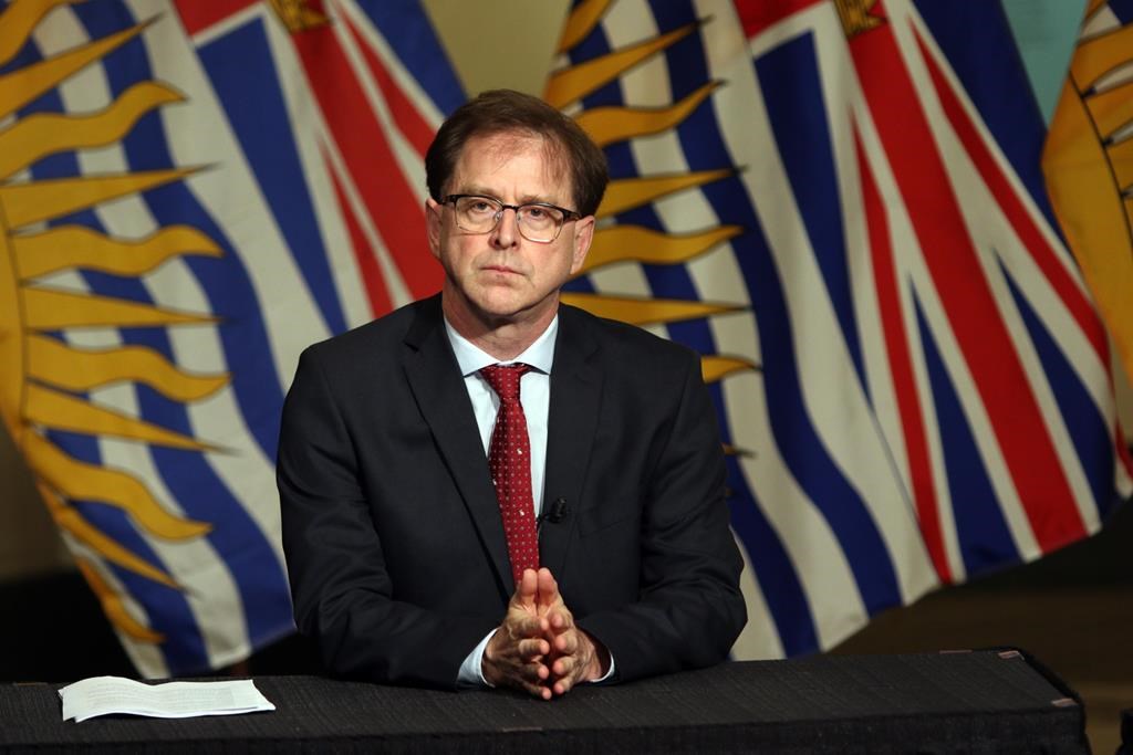 Health Minister Adrian Dix looks during a press conference in the rotunda at Legislature in Victoria, B.C., on Wednesday May 6, 2020. British Columbia's health minister says the province has hired more staff and increased operating-room hours to catch up on cancelled surgeries but a significant surge in COVID-19 cases could impact recovery. THE CANADIAN PRESS/Chad Hipolito.