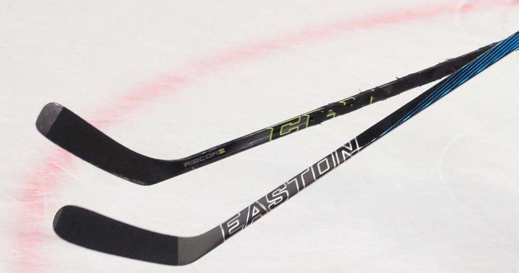 FILE: Players' sticks are shown during the Ice Hockey World Championships Group A match between Russia and Denmark, in Moscow, Russia, on Thursday, May 12, 2016.