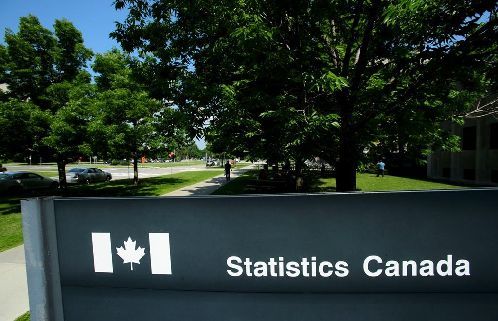 Statistics Canada building and signs are pictured in Ottawa on Wednesday, July 3, 2019. Statistics Canada will say today how inflation fared in June as more businesses reopened from pandemic-related lockdowns that put a damper on consumer spending. THE CANADIAN PRESS/Sean Kilpatrick.