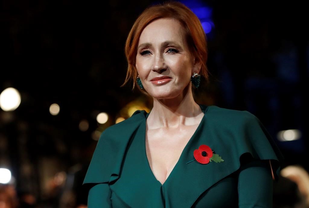 Writer J.K. Rowling poses for the media at the world premiere of the film 'Fantastic Beasts: The Crimes of Grindelwald' in Paris.