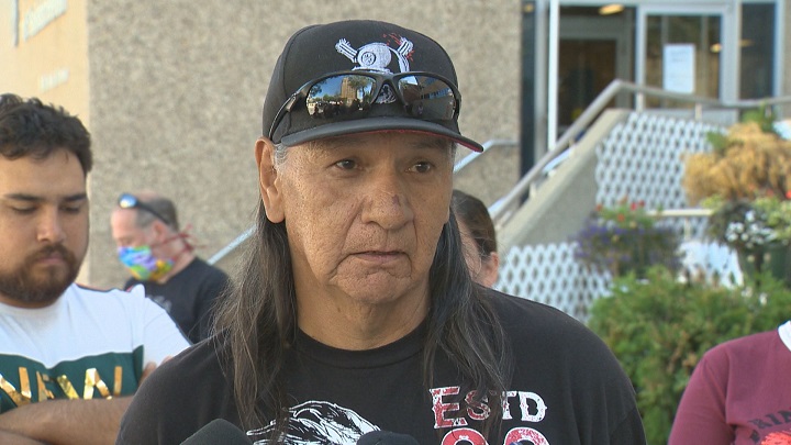 Rocky Lonechild’s father Lawrence Bigeagle speaks to media in front of Regina’s Court of Queen’s Bench on Monday. 