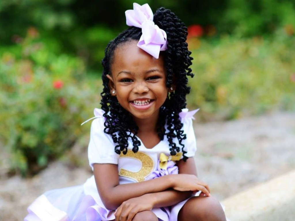 Madison Wilson, 7, is raising money to put multicultural books and crayons into classrooms. So far, she's raised more than US$14,500. 