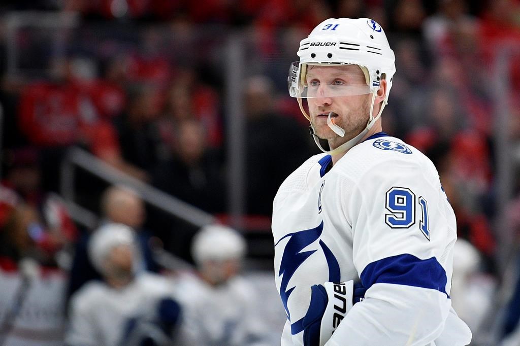 In this Dec. 21, 2019, file photo, Tampa Bay Lightning centre Steven Stamkos (91) looks on during the first period of an NHL hockey game against the Washington Capitals in Washington.