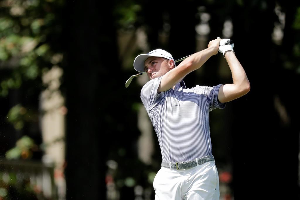 Justin Thomas hits toward the ninth green during the second round of the Memorial golf tournament, Friday, July 17, 2020, in Dublin, Ohio. (AP Photo/Darron Cummings).