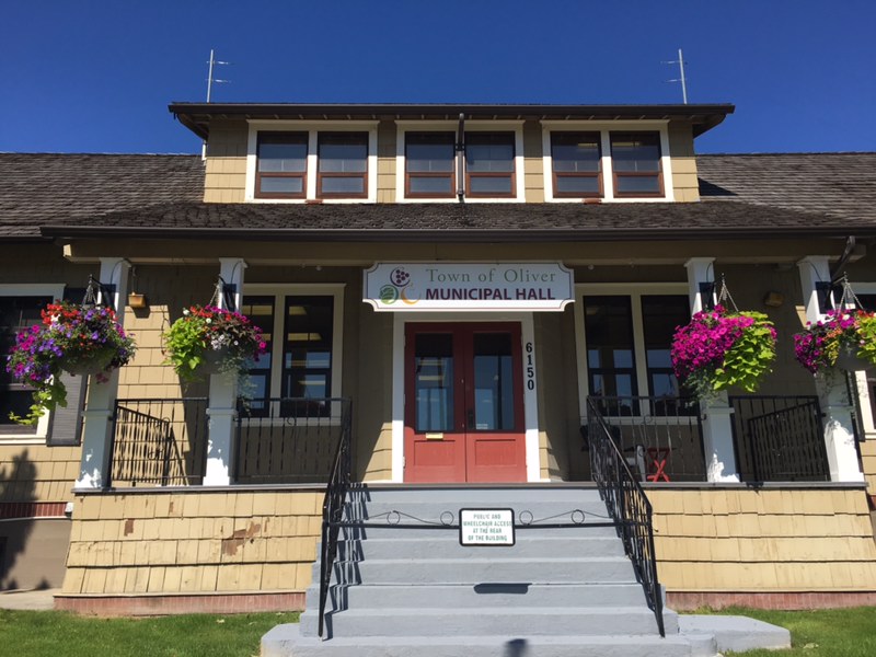 Oliver's town hall re-opens Tuesday after being shut down due to a COVID-19 scare on Monday. 