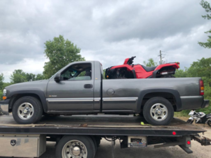 A pickup truck and ATV that Southern Georgian Bay OPP recovered in connection to a stolen property investigation.