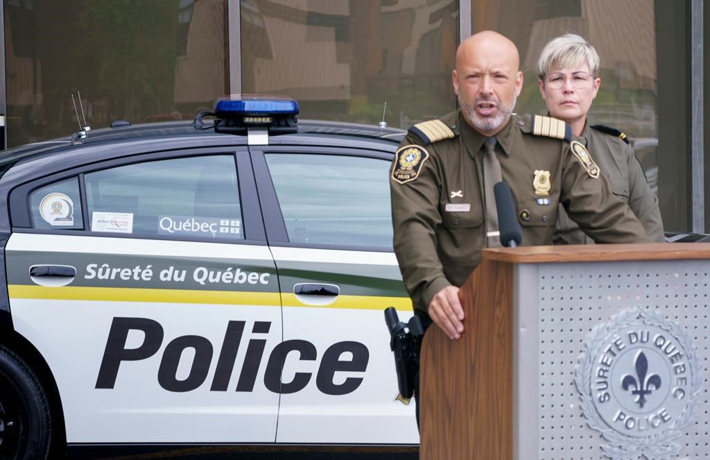 In this July 2020 file photo, Sûreté du Québec Chief Insp. Guy Lapointe responds to a question during a news conference in Montreal. The SQ announced Lapointe will be on loan to the BEI, effective next week. Monday, Oct. 19, 2020.