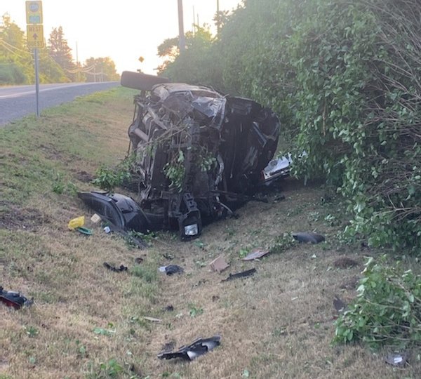 Driver sent to hospital with serious injuries following rollover in Kingston - image