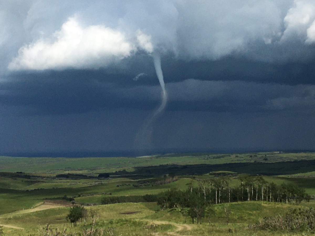 Possible tornado captured near Nanton.
