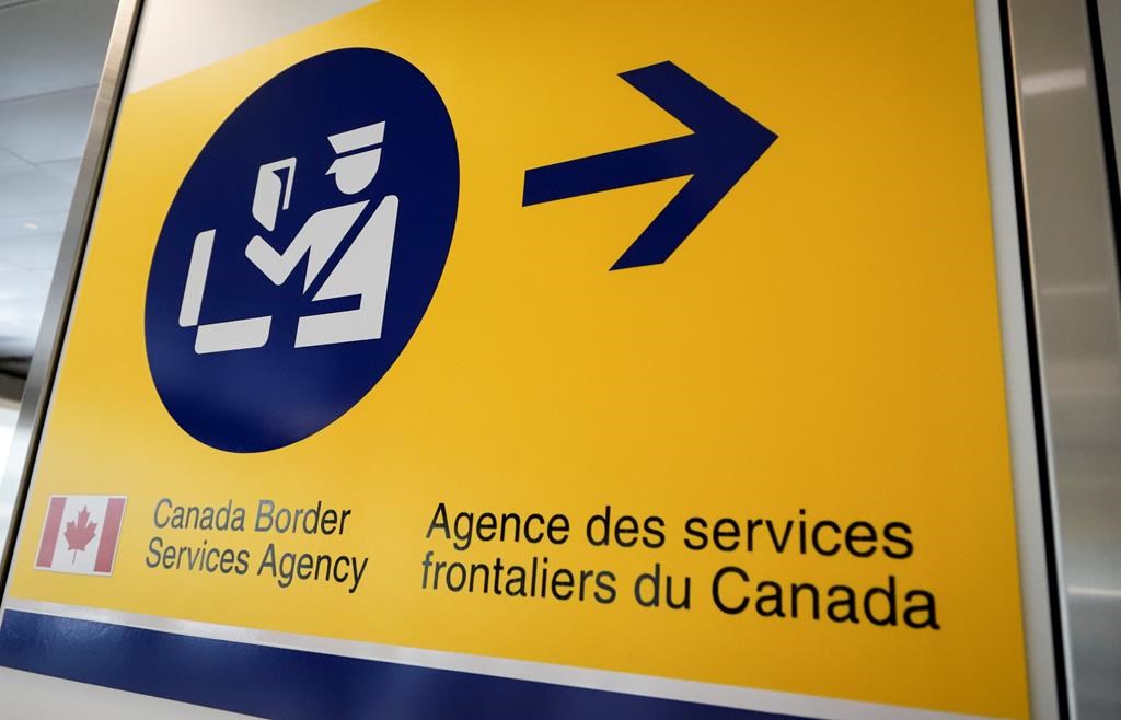 A Canada Border Services Agency (CBSA) sign is seen in Calgary, Alta., Thursday, Aug. 1, 2019. The federal auditor general says Canada's border agency has failed to promptly remove from Canada most of the people under orders to leave.THE CANADIAN PRESS/Jeff McIntosh.