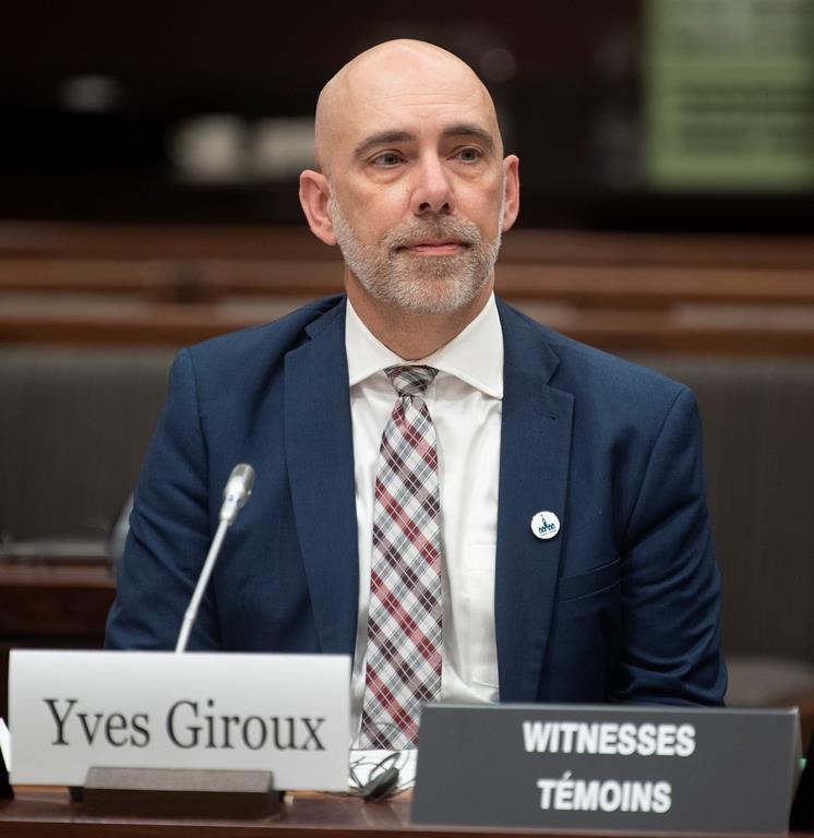 Parliamentary Budget Officer Yves Giroux waits to appear before the Commons Finance committee on Parliament Hill in Ottawa, Tuesday, March 10, 2020.