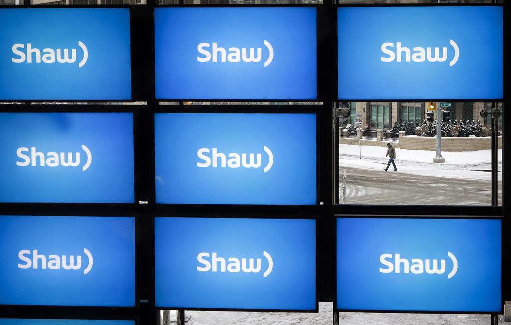 Shaw logos are on display at the company's annual meeting in Calgary, Jan. 17, 2019.