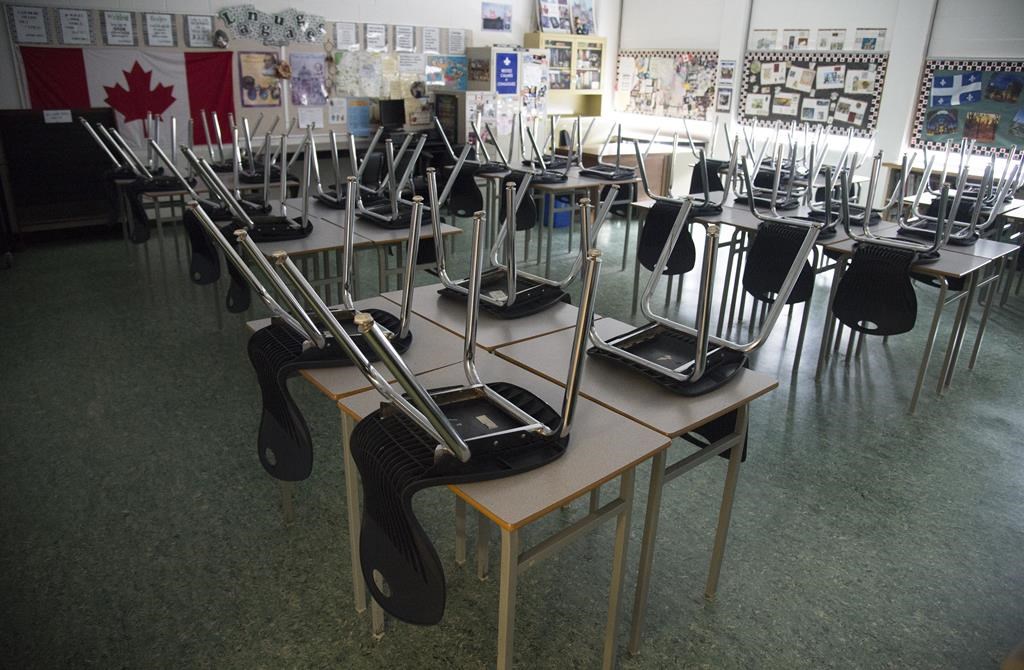 A empty classroom is pictured at Eric Hamber Secondary school in Vancouver, B.C. Monday, March 23, 2020. Newfoundland and Labrador's plan for the upcoming school year aims to maximize in-class attendance with the option for schools to return to remote learning if COVID-19 risk increases.