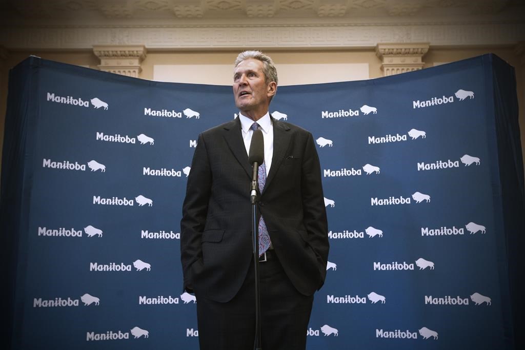 Manitoba premier Brian Pallister speaks to media after the tabling of his party's provincial budget was filibustered by the opposition NDP at the Manitoba Legislature in Winnipeg, Wednesday, March 11, 2020.