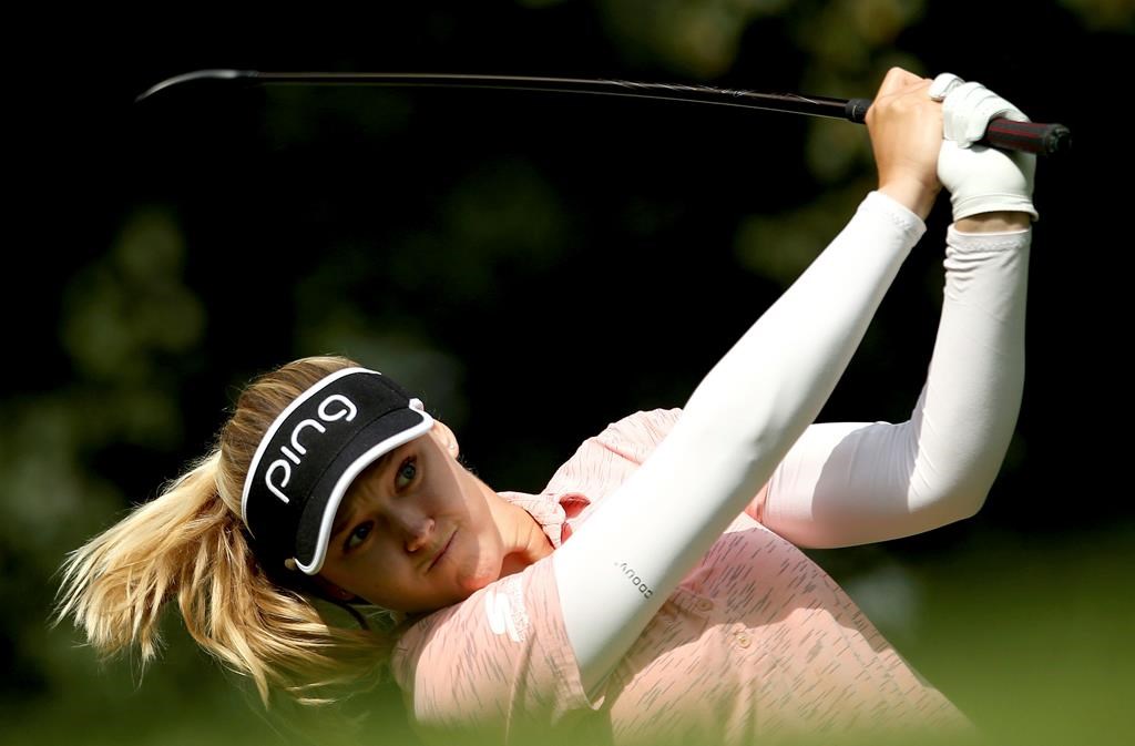 Canada's Brooke Henderson plays off the 12th tee on day two of the Women's British Open at Woburn Golf Club, Little Brickhill, England, Friday Aug. 2, 2019. THE CANADIAN PRESS/AP-Steven Paston/PA via AP.