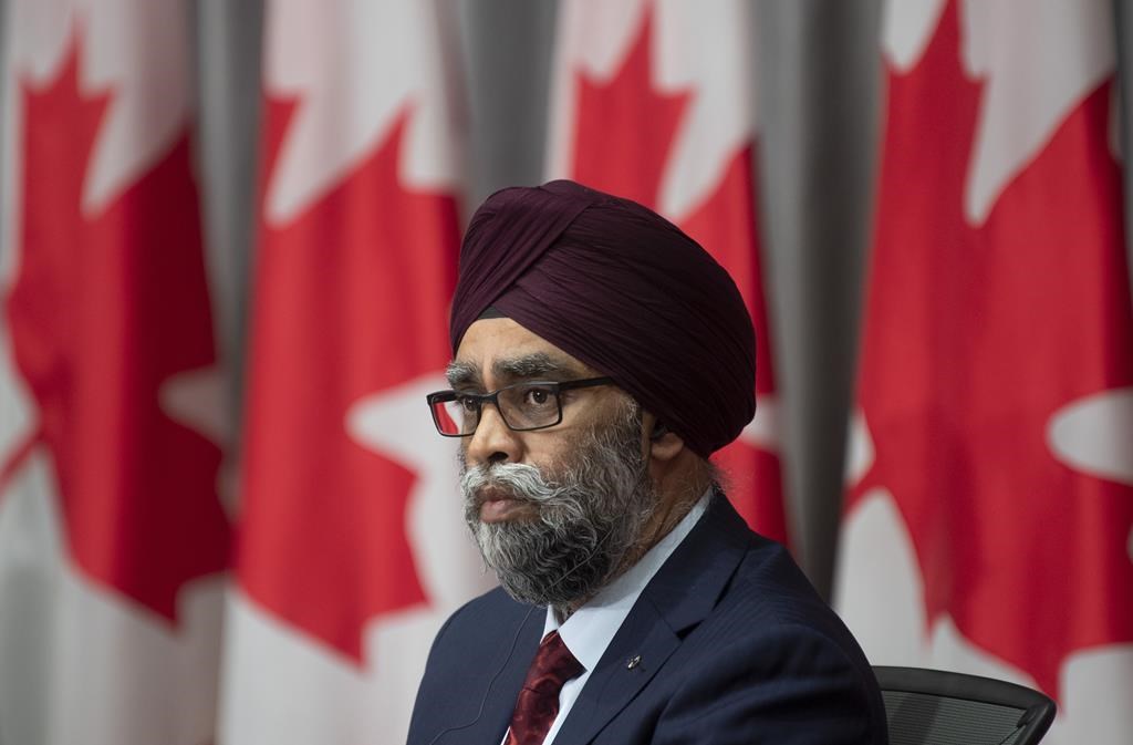 National Defence Minister Harjit Sajjan listens to a question during a news conference, Friday, June 26, 2020 in Ottawa.