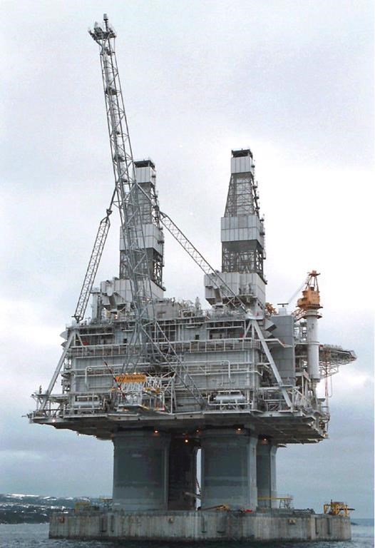 The Hibernia platform stands above the waters of Bull Arm, Trinity Bay, Nfld. in a 1997 file photo. Production at the Hibernia offshore production platform 315 kilometres east of St. John’s, N.L., has been halted after an apparent leak of drilling and productions fluids.